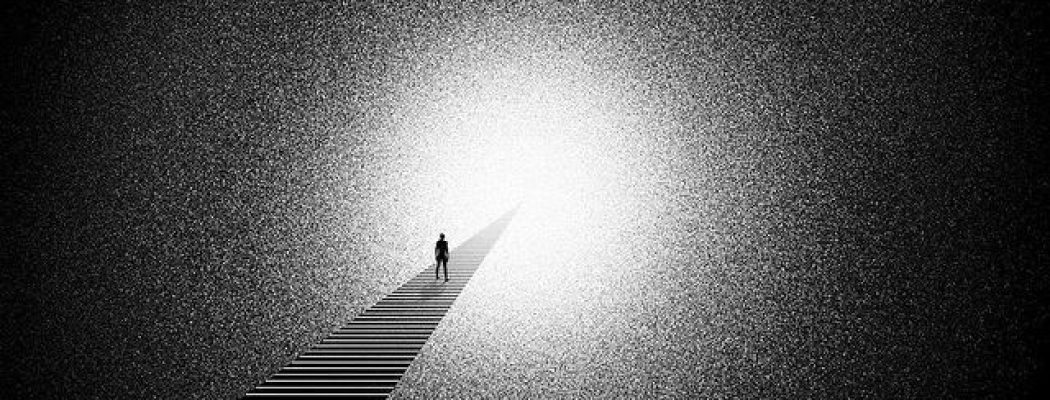 A lone silhouette walking toward a light representing the transition of consciousness after Death.