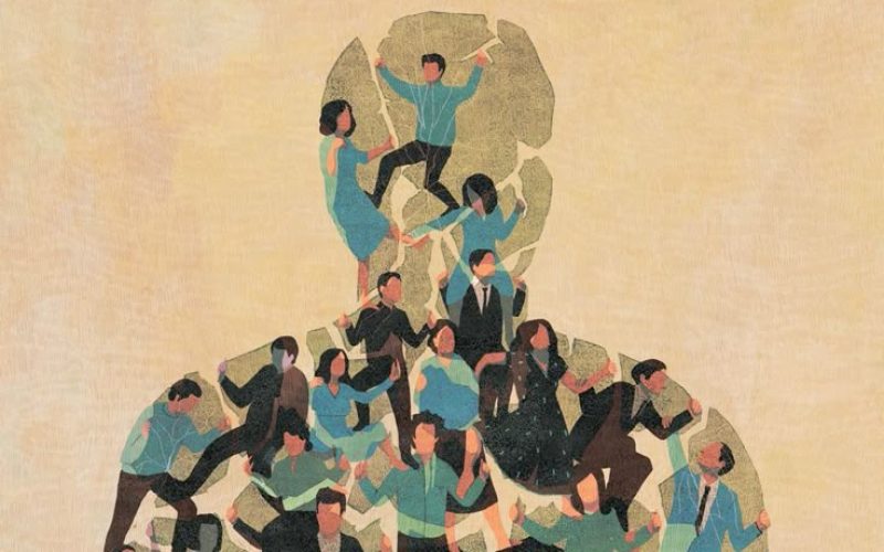 The Group of People Holding Stone Pieces